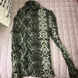 Green snake pattern turtle neck